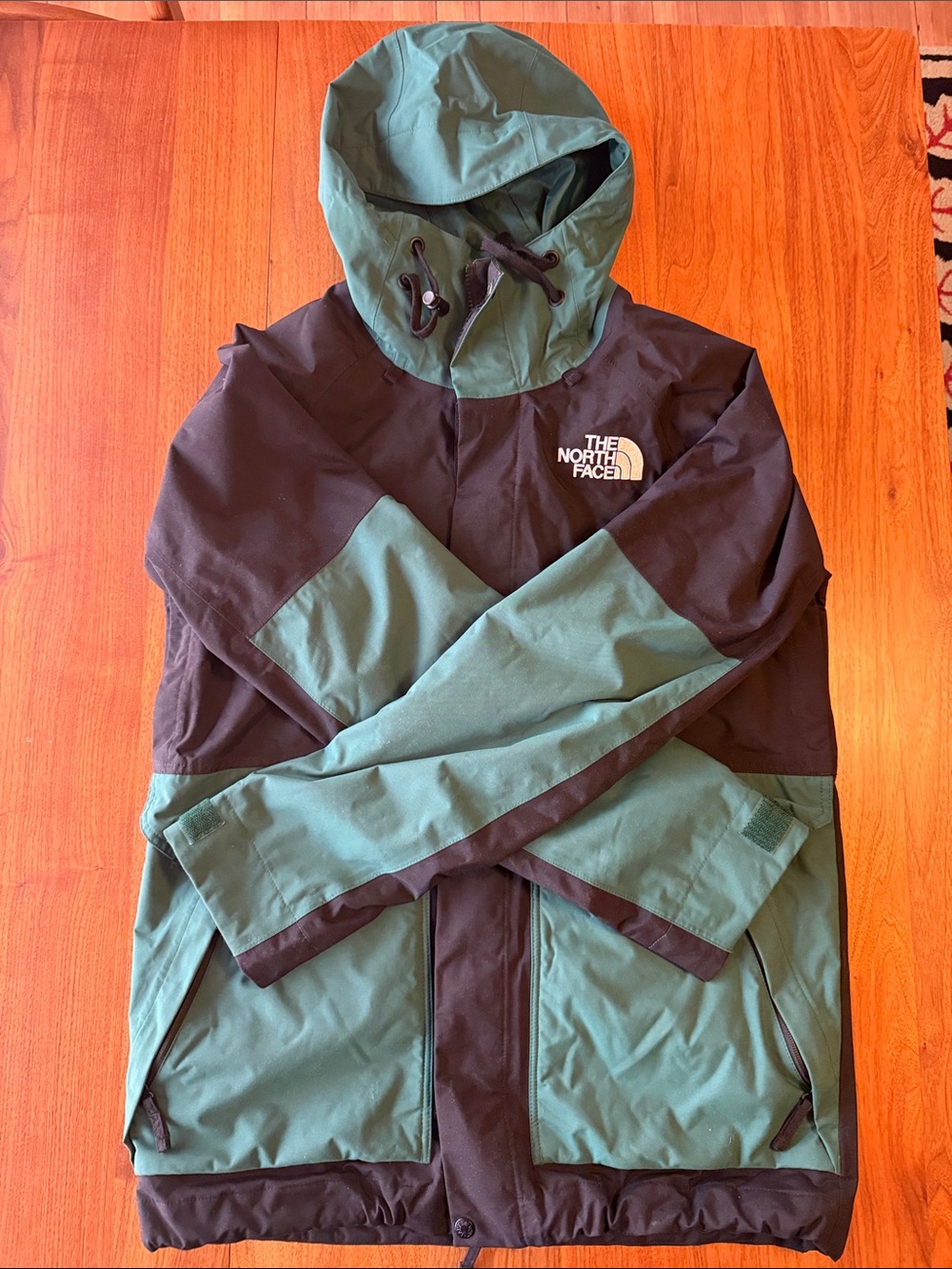 The North Face Black and Green Hooded Shell Jacket